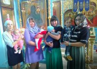 В нашем храме крестились сразу 4 тихвиненка